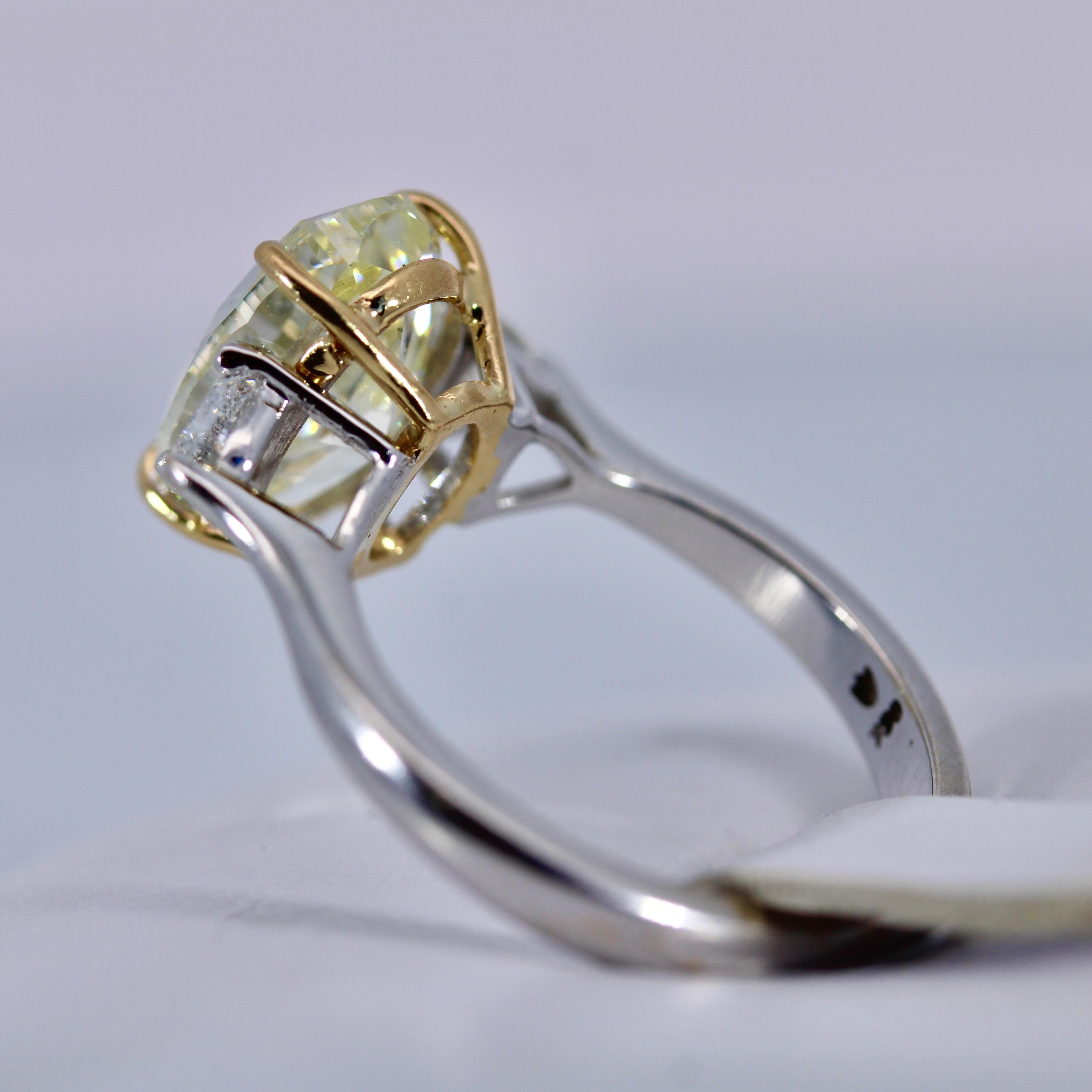 Contemporary GIA Certified 3.67 Carat Light Yellow Diamond 18K White Gold Solitaire Ring For Sale