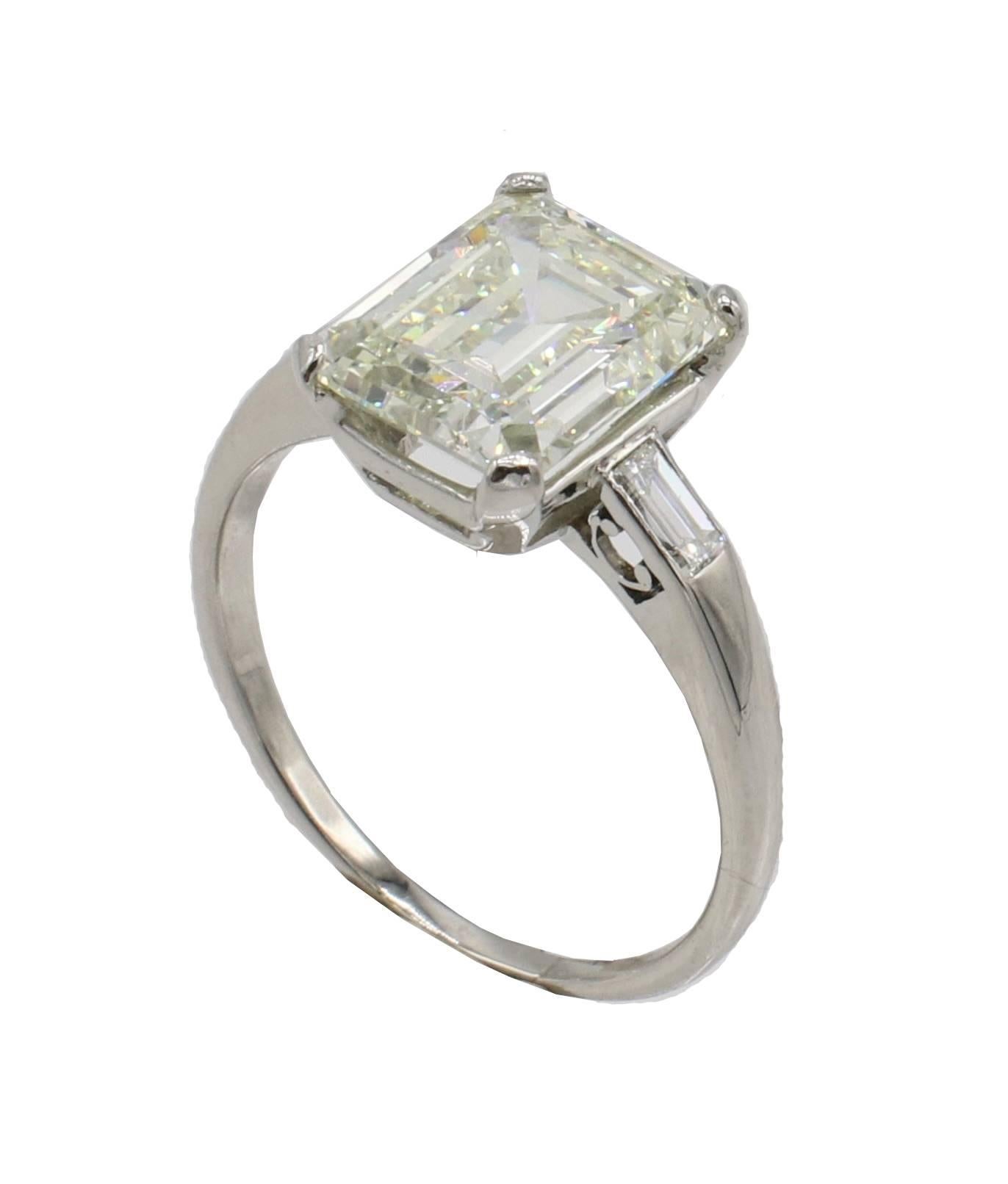 GIA Certified 3.67 Carat M VS2 Emerald Cut Natural Diamond Engagement Ring 
GIA report number: 2235539846
Diamond: 3.67 Carat M VS2 Emerald Cut Natural Diamond
Accent diamonds: Approx. .30 CTW H-I baguette natural diamonds
Metal: Platinum
Weight: