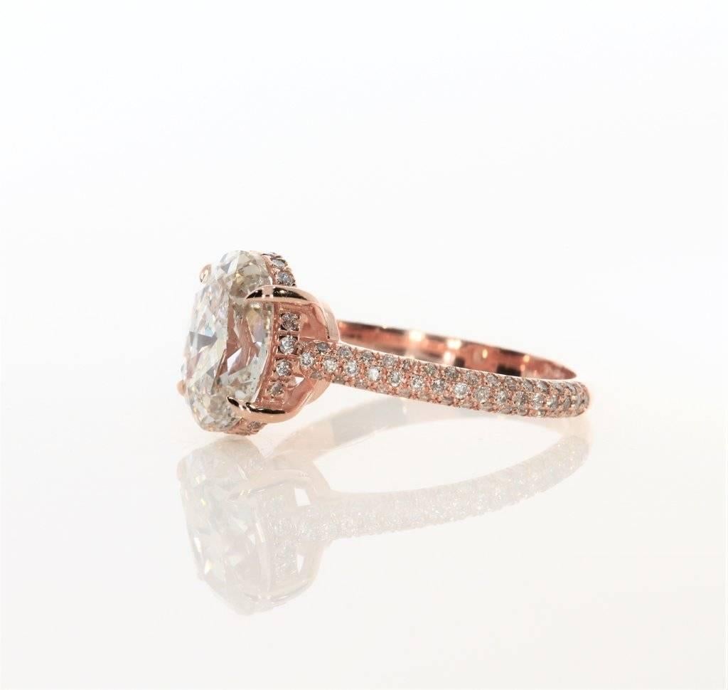 rose gold oval cut engagement rings