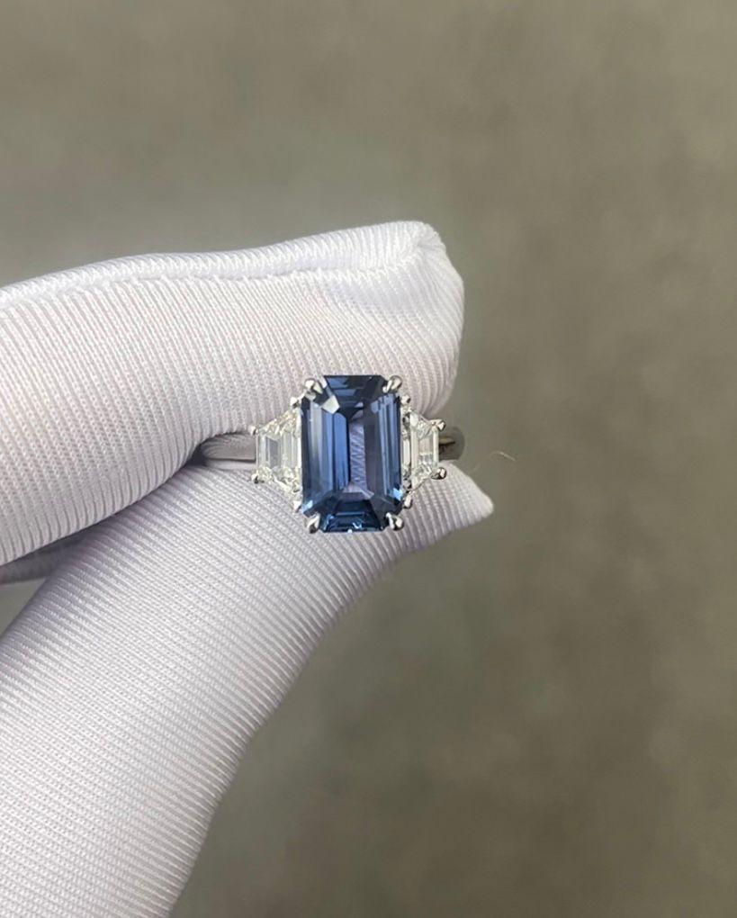 GIA Certified Emerald Cut Ceylon Sapphire weighing 3.74 carats
Measuring (11.07x7.10x4.63) mm
Diamonds weighing .61 carats
Set in Platinum