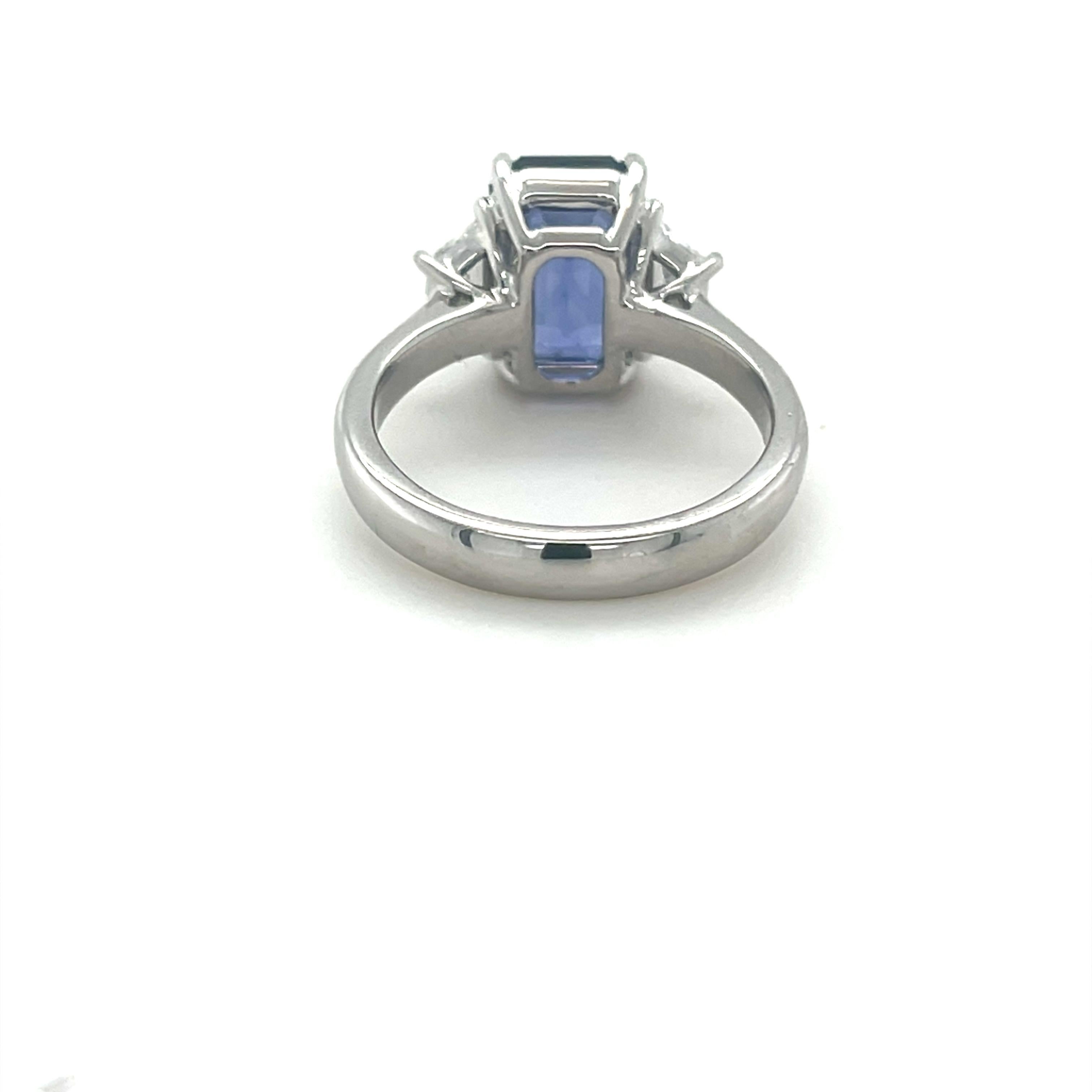 GIA Certified 3.74 Carat Emerald Cut Ceylon Sapphire & Diamond Ring in Platinum In New Condition For Sale In Great Neck, NY