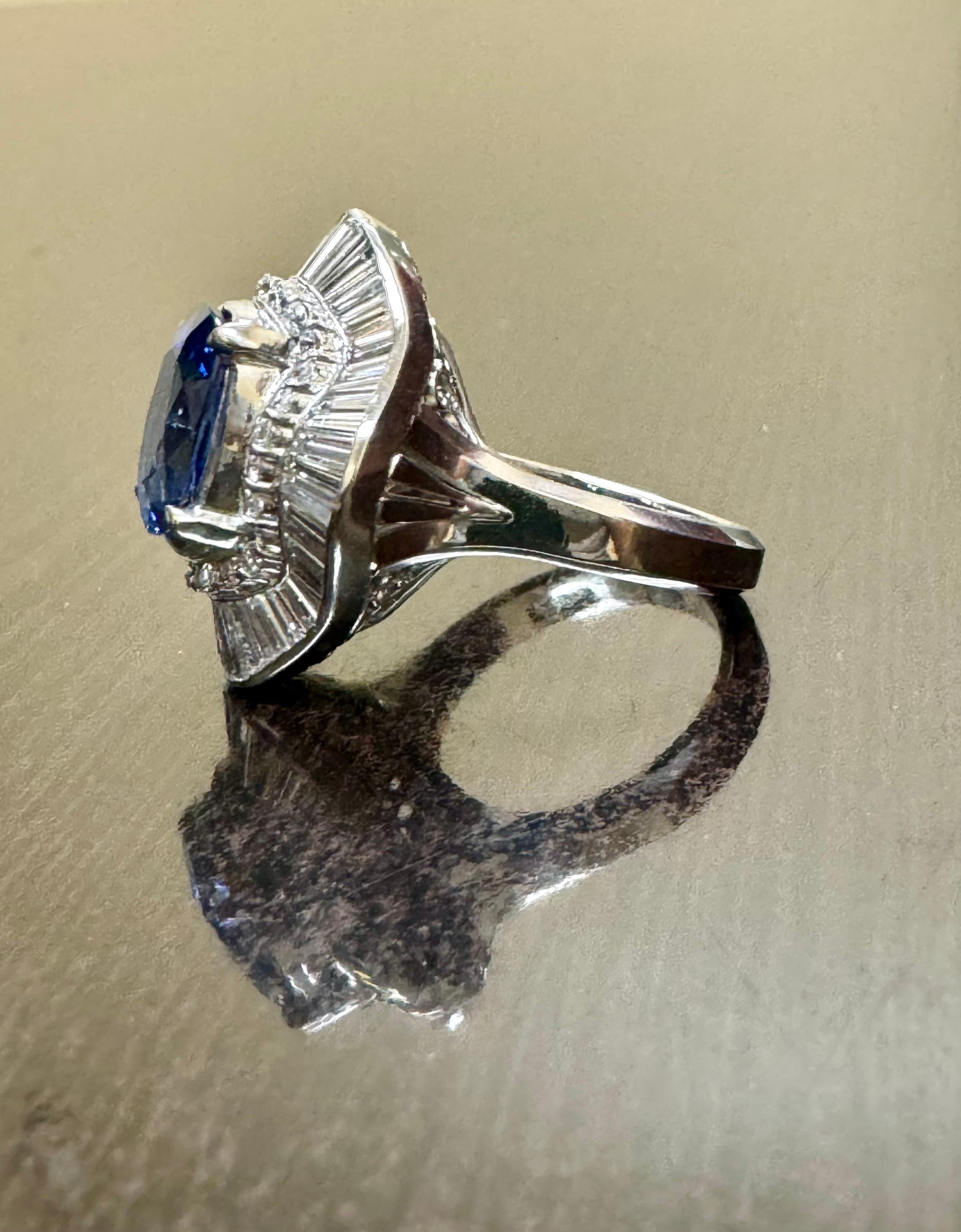 GIA Certified 3.74 Carat Oval Blue Sapphire Baguette Diamond Engagement Ring For Sale 8
