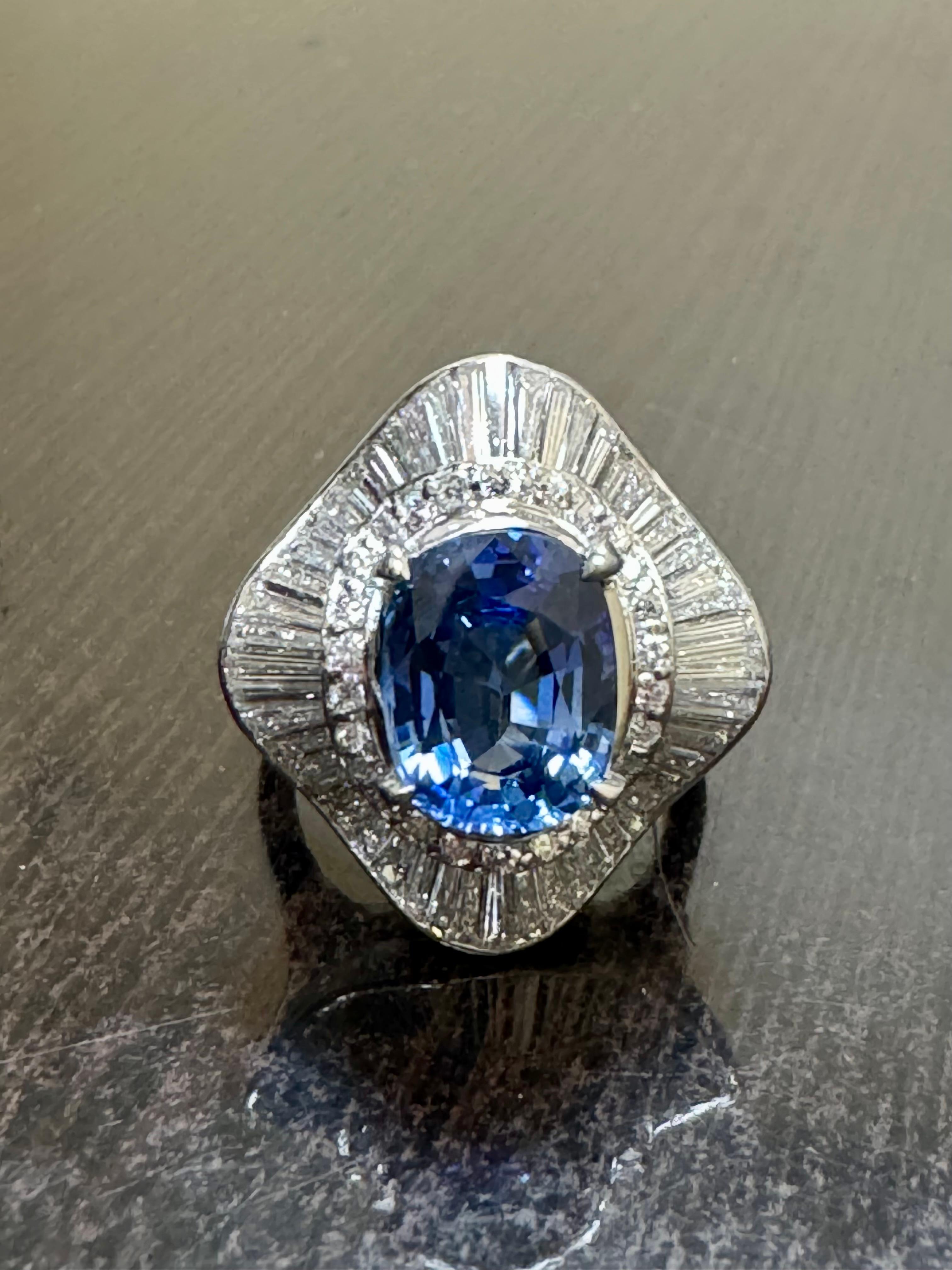 Women's GIA Certified 3.74 Carat Oval Blue Sapphire Baguette Diamond Engagement Ring For Sale