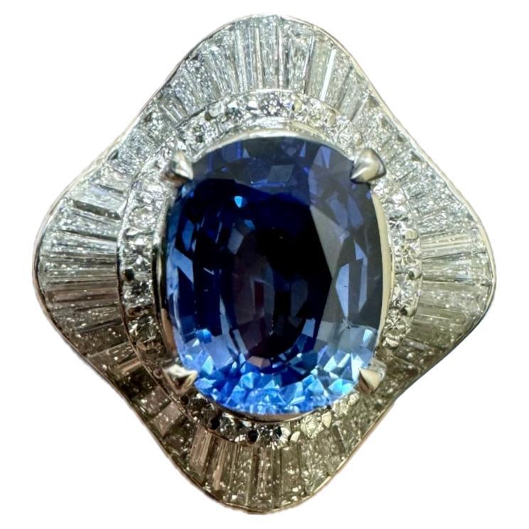 GIA Certified 3.74 Carat Oval Blue Sapphire Baguette Diamond Engagement Ring For Sale