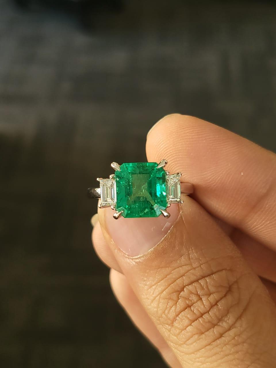 A very beautiful Emerald Engagement Ring set in Platinum 900 & Diamonds. The weight of the Emerald is 3.78 carats. The Emerald is natural, of Columbian origin and is accompanied by a GIA. The weight of the Diamonds is 0.69 carats. Nat platinum