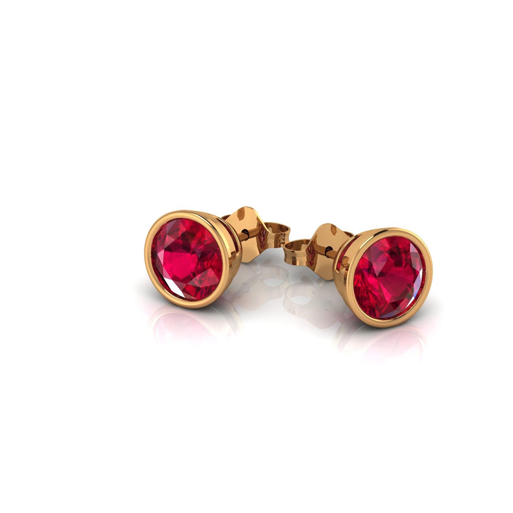 Gia Certified 3.78 carat pair of intense Red Rubies set in 18k yellow gold bezel stud earrings.
Push back and post, complimentary customization to screw back post, upon order.
Other customization available 