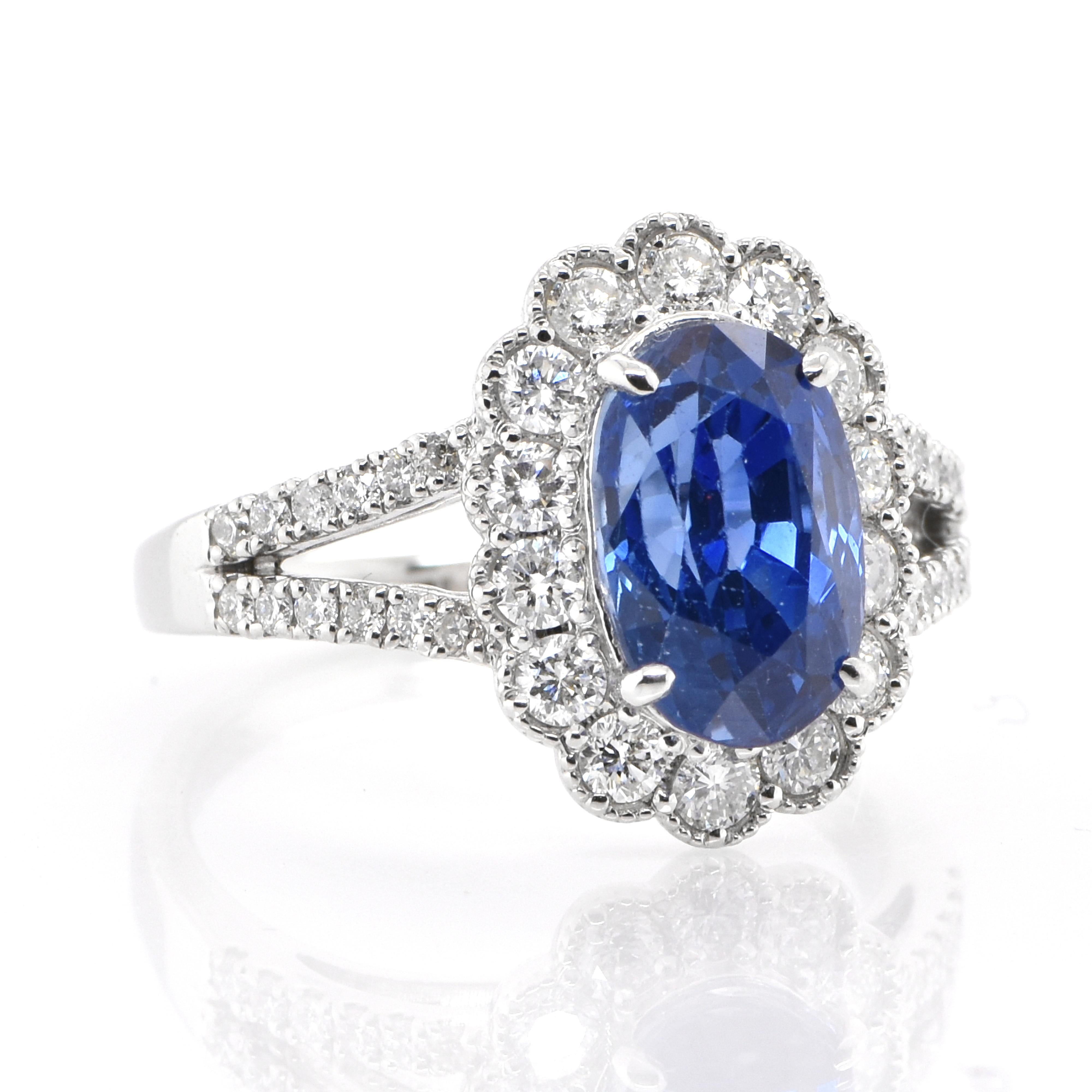 Modern GIA Certified 3.79 Carat Natural, Ceylon Sapphire & Diamond Ring Set in Platinum For Sale