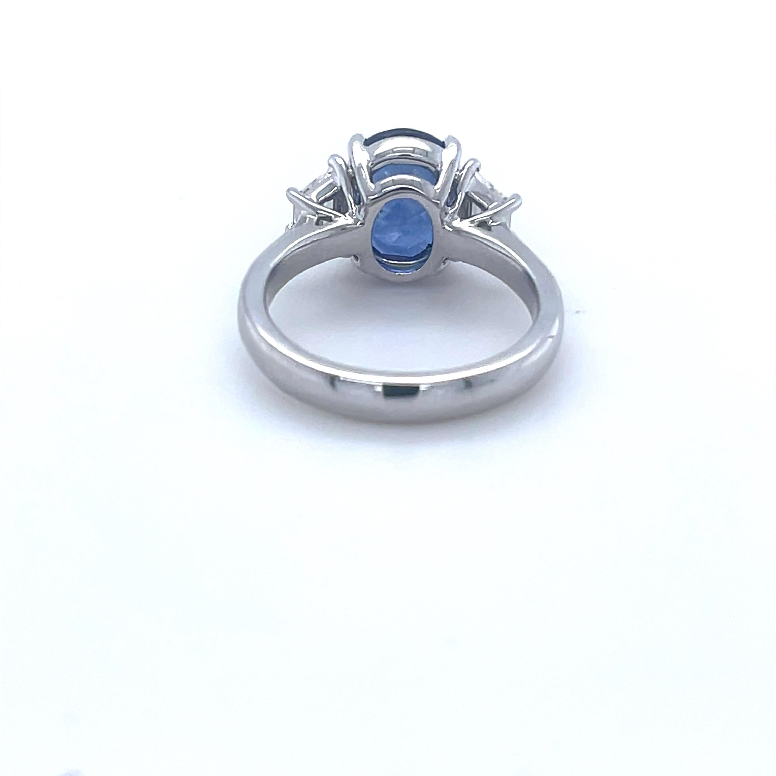 Modern GIA Certified 3.80 Carat Ceylon Sapphire & Diamond Three stone Ring in Platinum