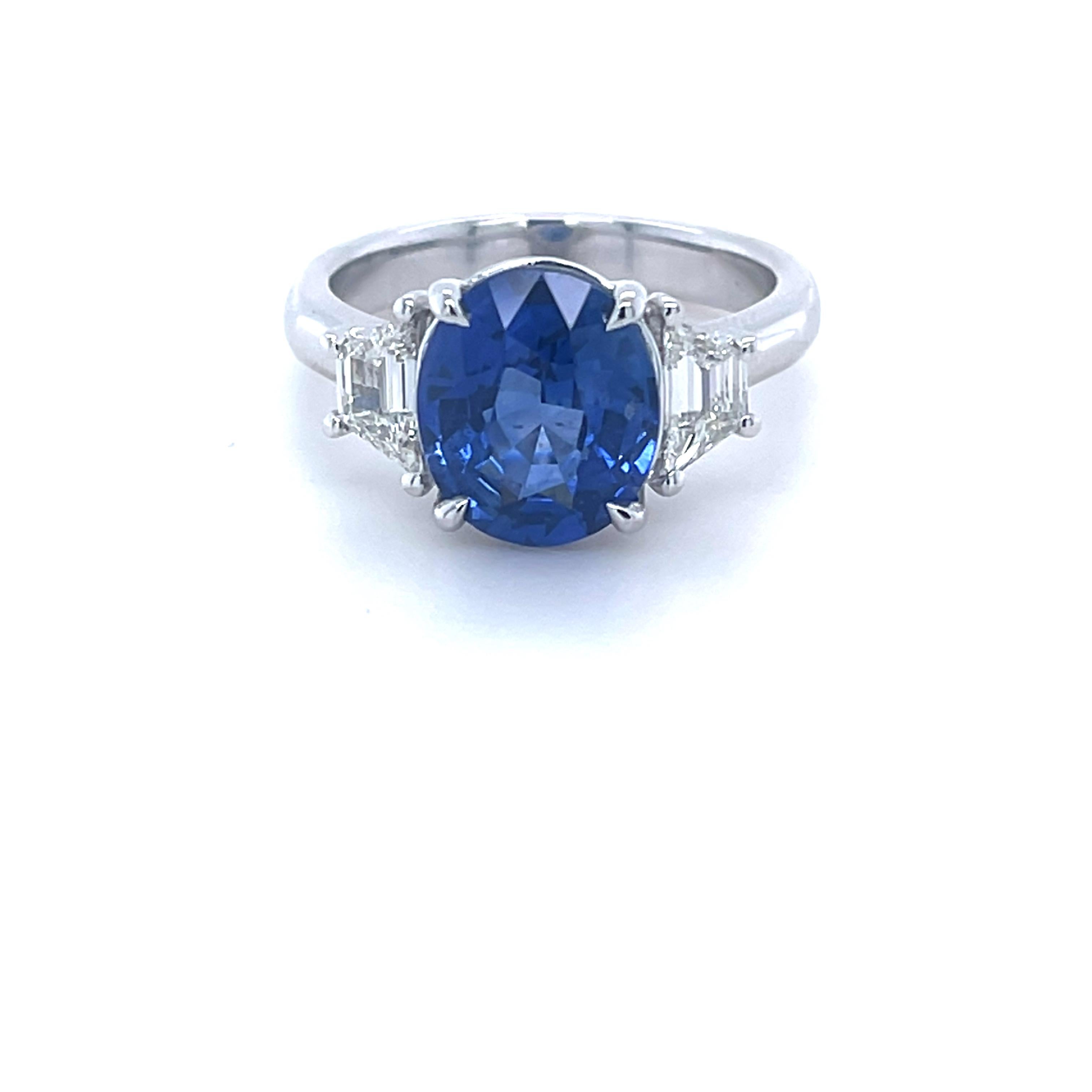 Oval Cut GIA Certified 3.80 Carat Ceylon Sapphire & Diamond Three stone Ring in Platinum
