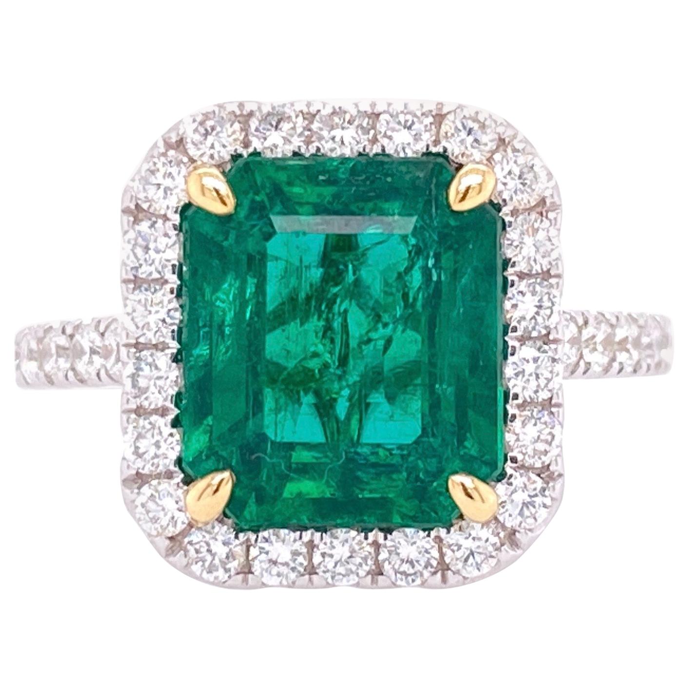 GIA Certified 3.80 Carat Emerald and Diamond Ring For Sale
