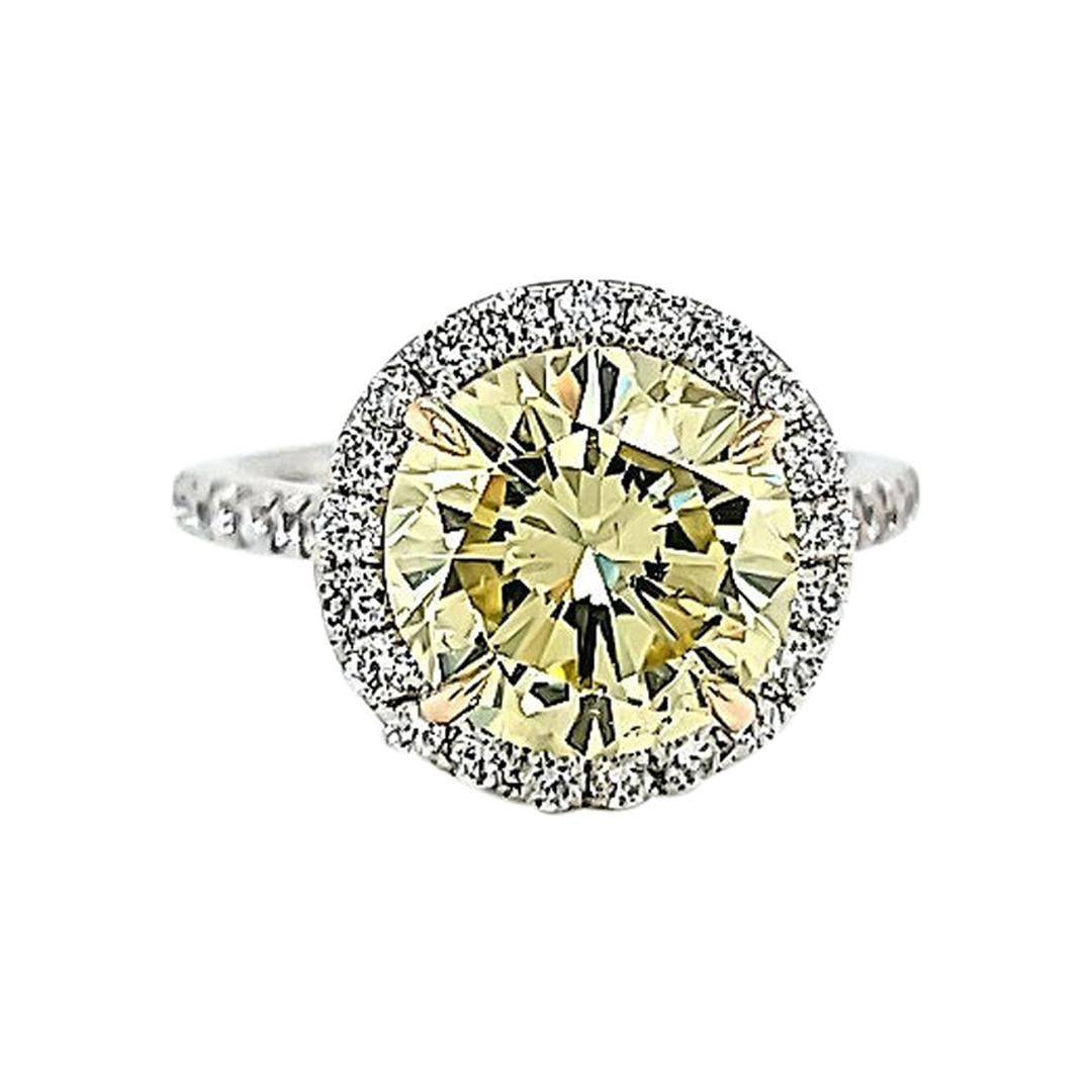 GIA Certified 3.87 Carats Fancy Yellow Diamond Ring