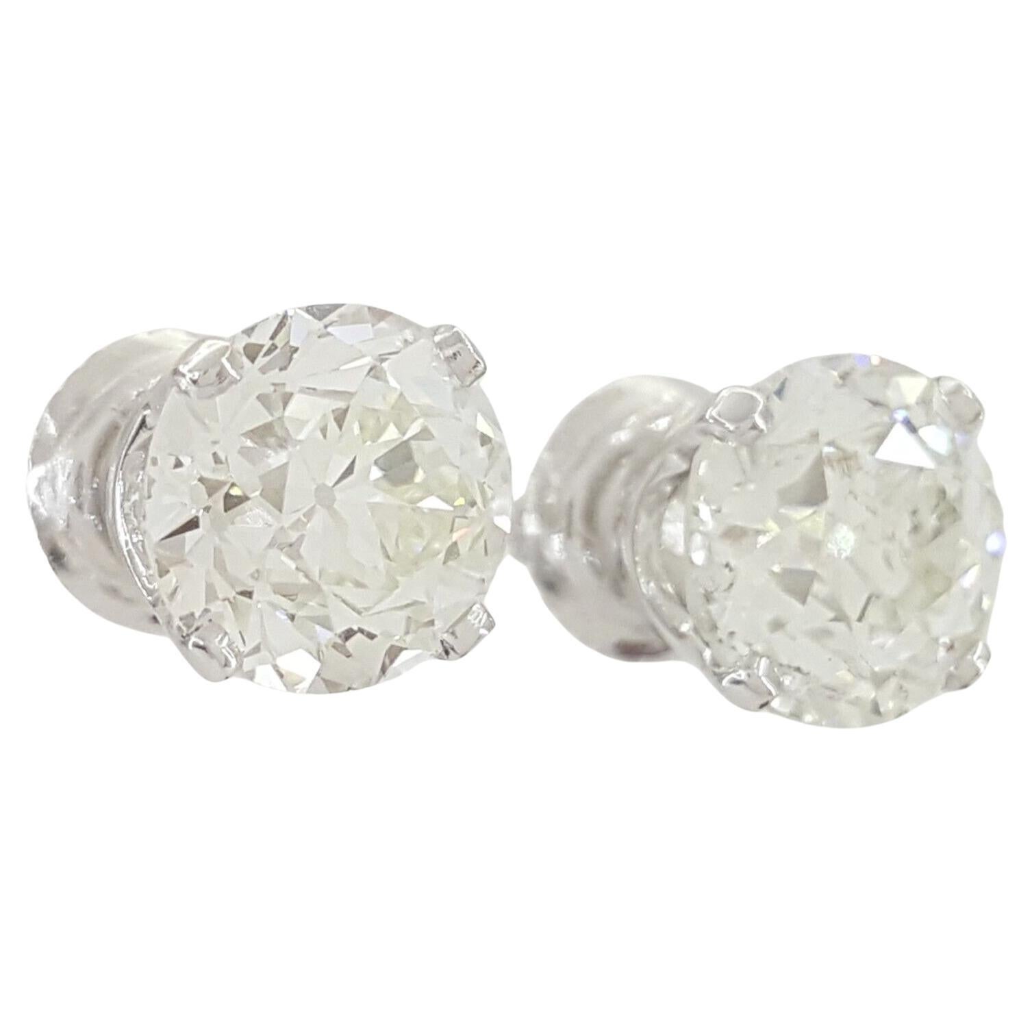 GIA Certified 3.88 ct Vintage Old European Cut Diamond Stud Earrings In Excellent Condition For Sale In Chicago, IL