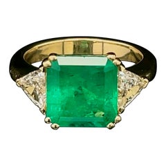GIA Certified, 3.92ct Step Cut Green Emerald and Diamond Ring
