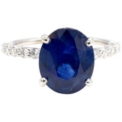 GIA Certified 3.96 Carat Oval Blue Sapphire and Diamond Cocktail Ring
