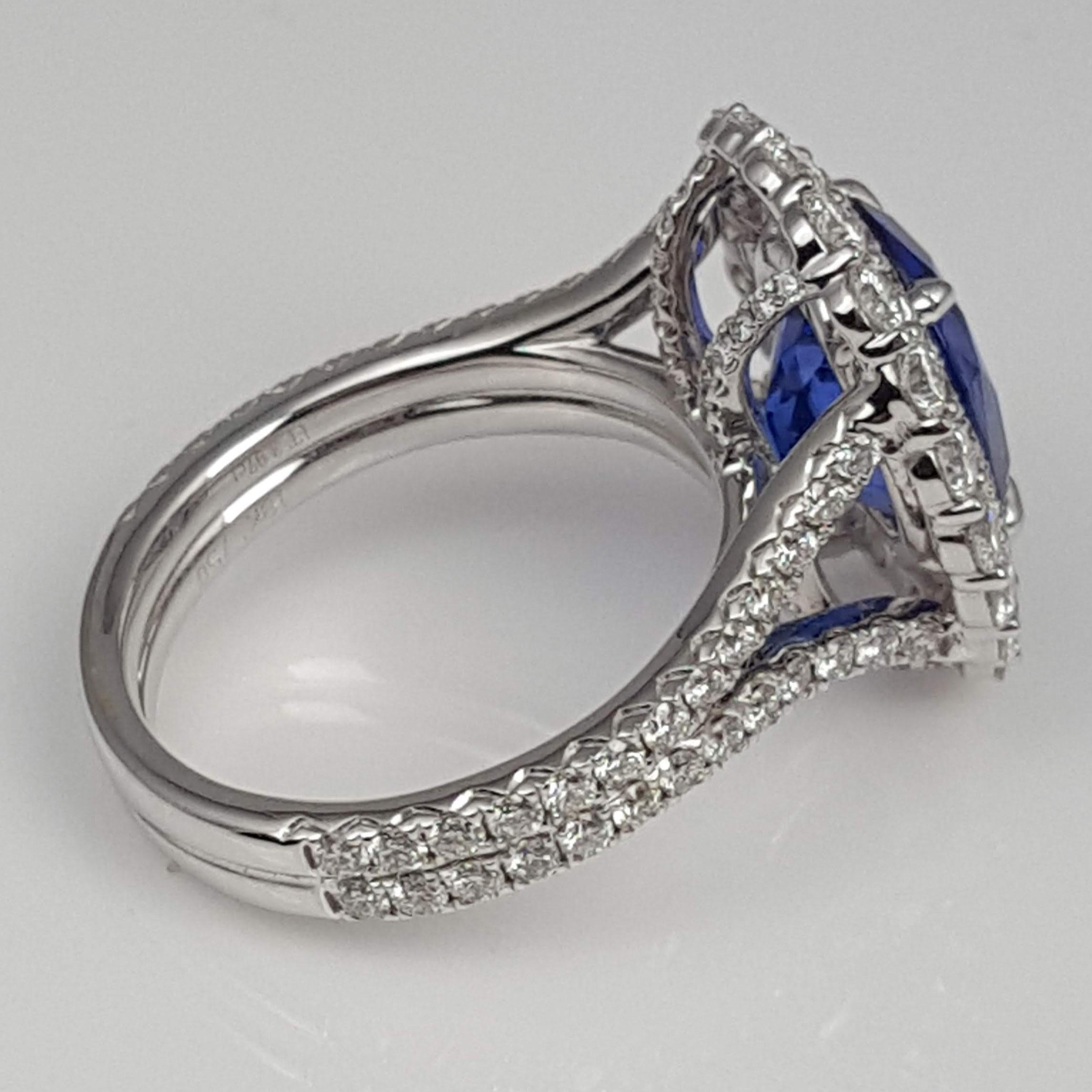 Women's GIA Certified 3.97 Carat Oval Cut Tanzanite and Diamond Halo Ring ref632 For Sale