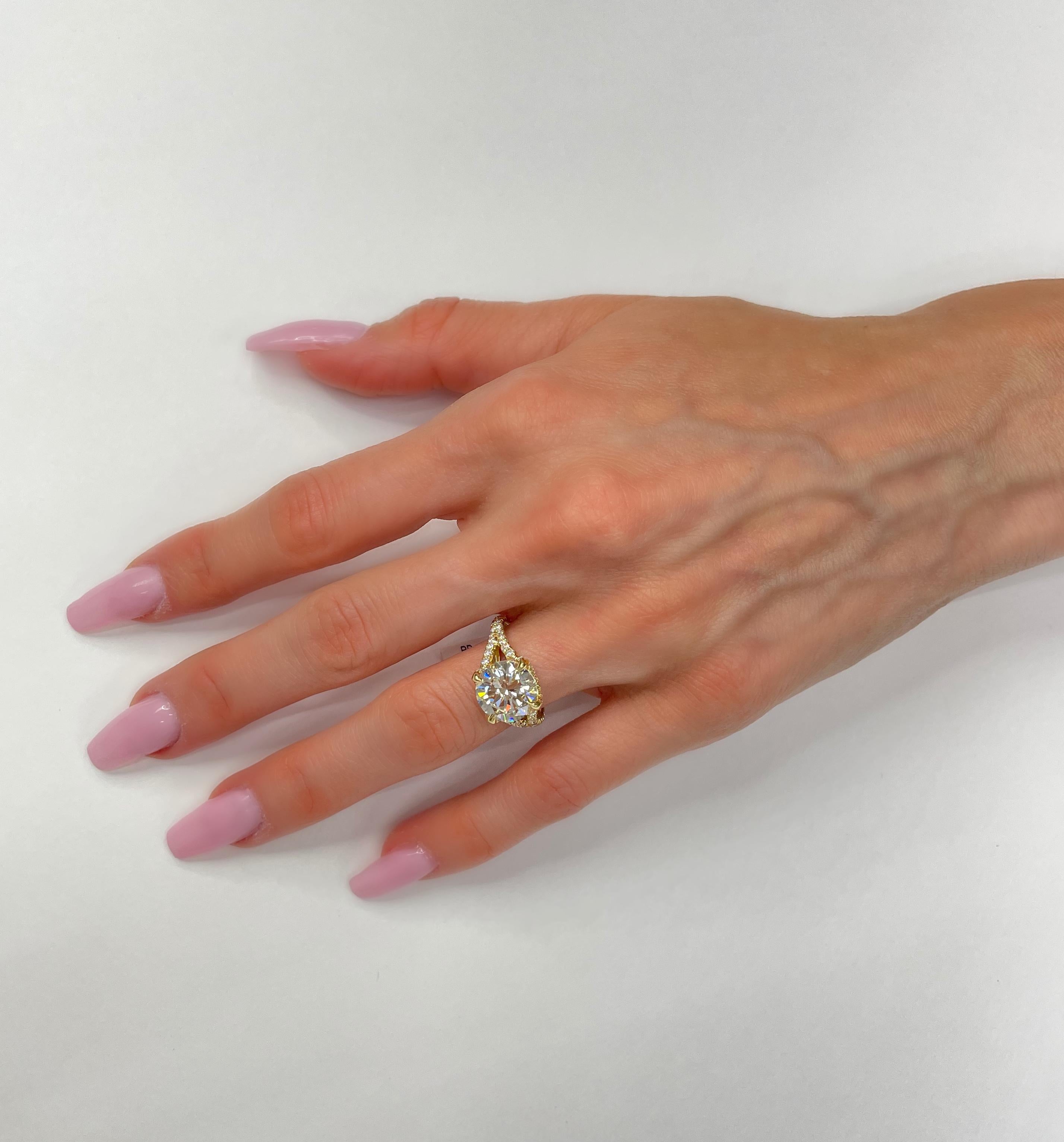 Modern GIA Certified 3.98 Carat, Round Brilliant Diamond Halo Ring