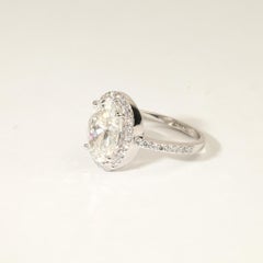 GIA-Certified 3ct Oval-Cut Diamond Halo Engagement Ring in 18K White Gold