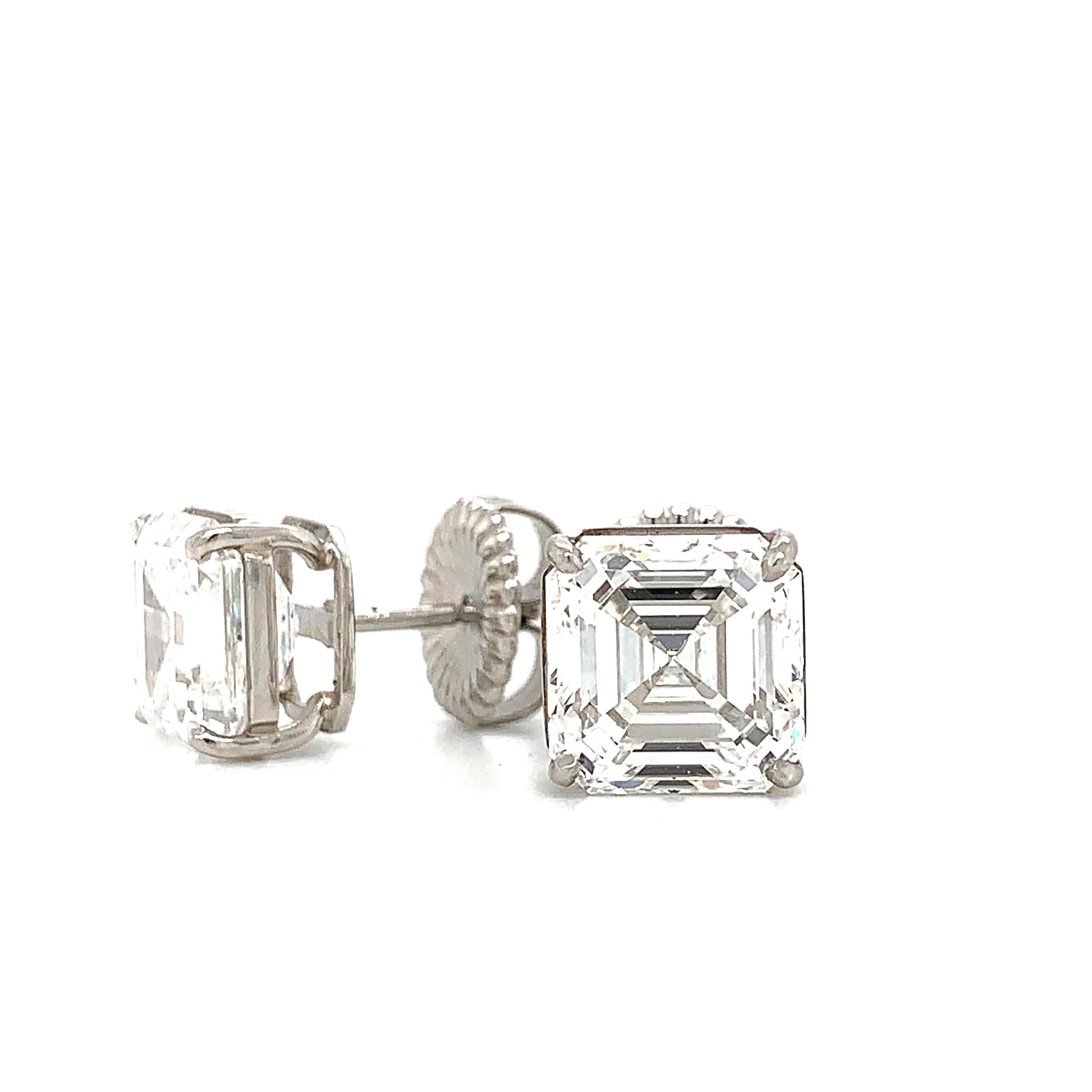 These astonishing matching pair of asscher cut (square emerald) cut diamond studs are mounted in hand made platinum.Graded by the GIA to be F-G color VS2 clarity. 
And weigh over 4 carats each. 

This pair of extraordinary 4 carat diamonds are rare