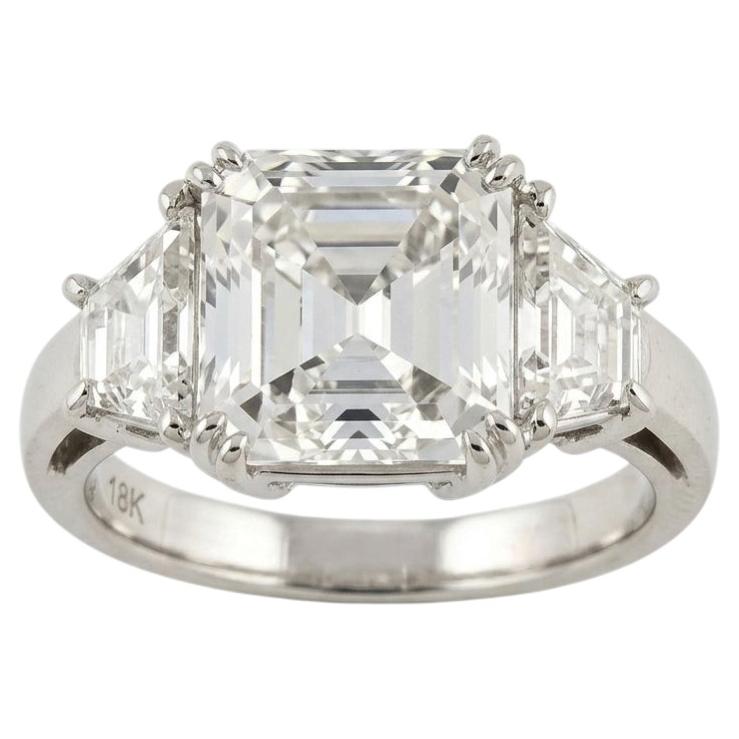 GIA Certified 4 Carat Asscher Cut Diamond Trapezoid Three-Stone Ring For Sale