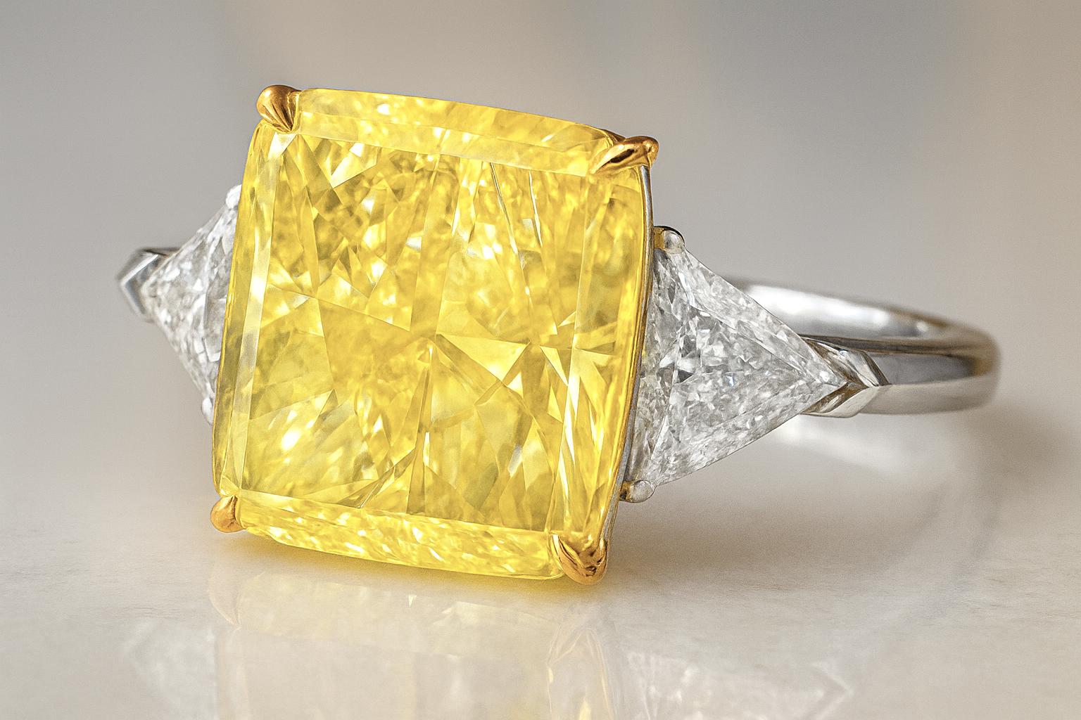 Contemporary GIA Certified 4 Carat Cushion Fancy Intense Yellow Diamond Ring For Sale