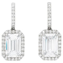 GIA Certified 4 Carat Emerald Cut Diamond D Color VVS Clarity Dangle Earrings