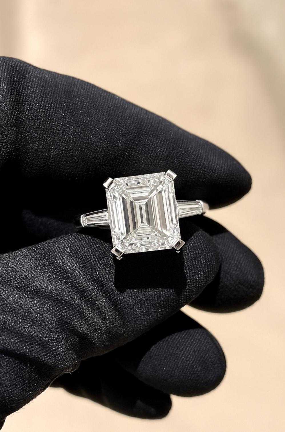 Contemporary GIA Certified 4 Carat Emerald Cut Diamond Engagement Platinum Ring For Sale