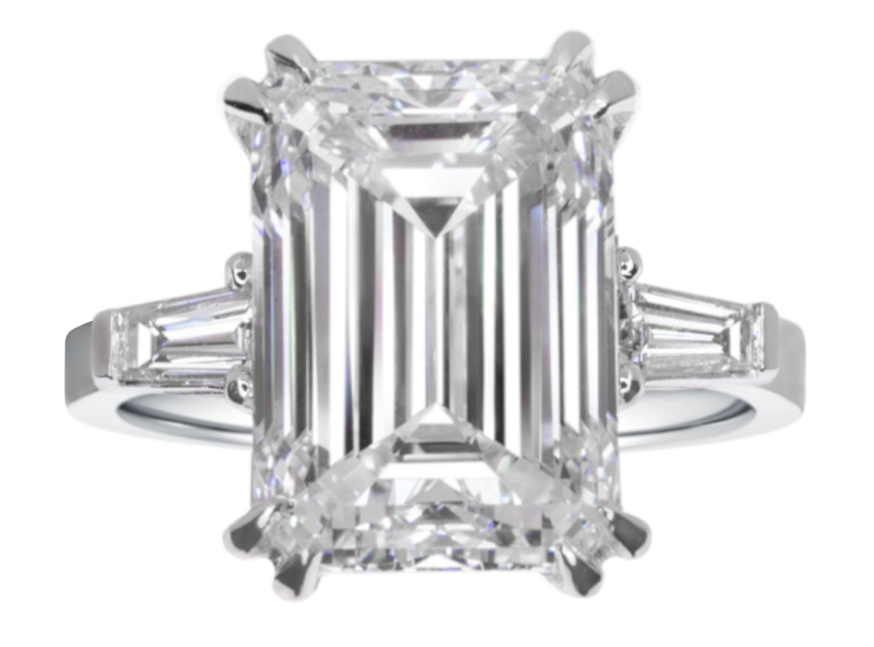 Presenting an exquisite GIA-certified emerald-cut diamond ring that radiates sophistication and timeless allure.

Center Diamond:
At the heart of this captivating piece is a GIA-certified emerald-cut diamond, weighing an impressive 4 carats. Graced