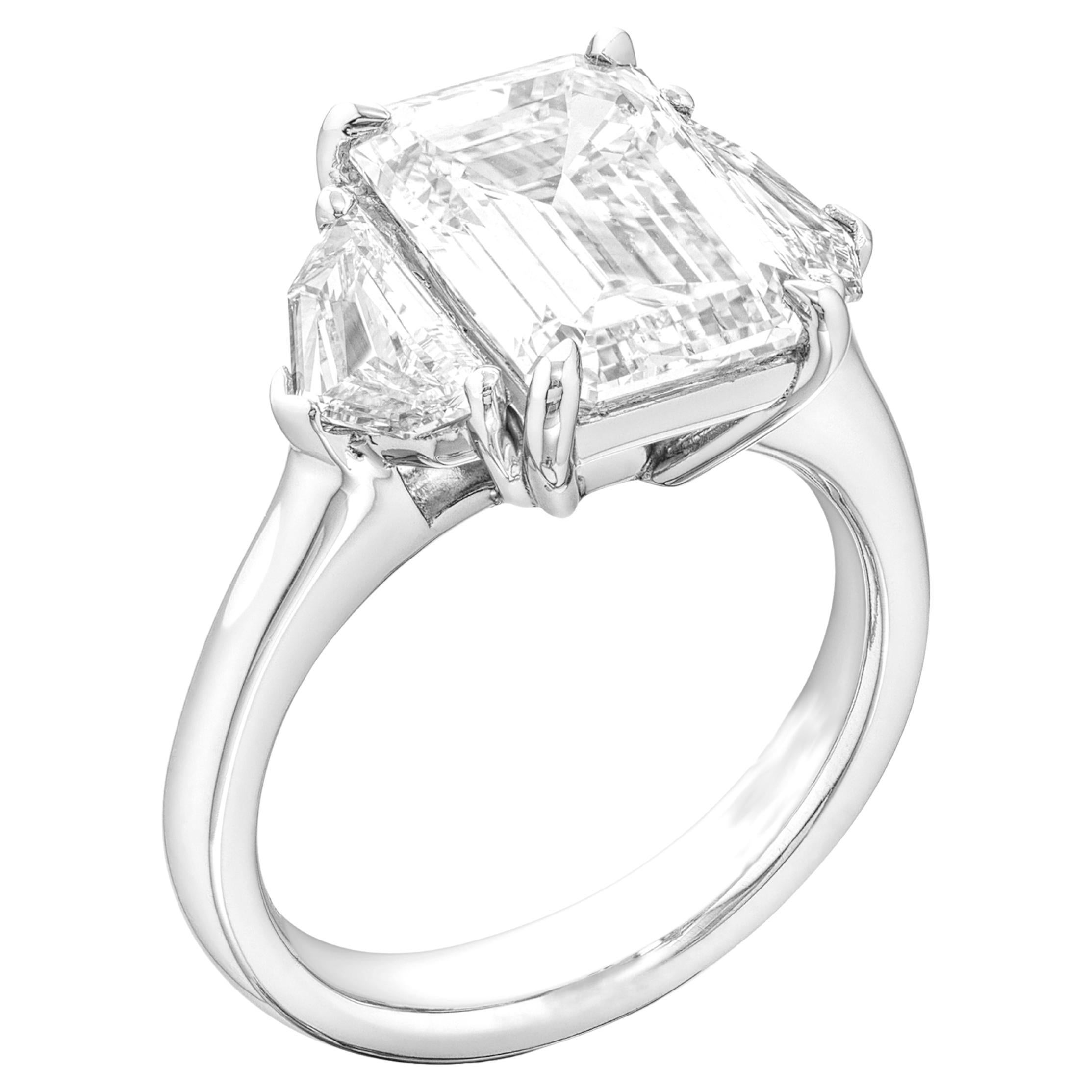 A striking blend of unique and timeless elegance, this exquisite ring showcases a rare GIA-certified 4 carat emerald cut diamond. With excellent proportions (10.73 x 7.66 x 5.00 mm), this diamond exhibits the unmistakable character of perfect