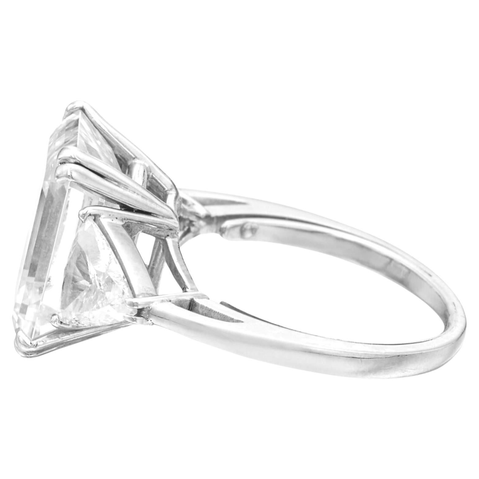 Contemporary GIA Certified 4.06 Carat Emerald Cut Diamond Ring with Trillion Cut Diamond For Sale