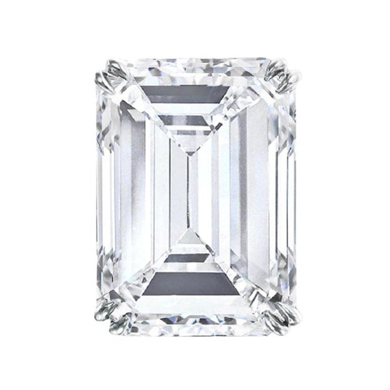 These exceptional diamond stud earrings feature two emerald-cut diamonds with a combined weight of 4.01 carats, expertly set in platinum. Each diamond is perfectly matched, with individual weights of 2 and 2.01 carats, adding balance and harmony to