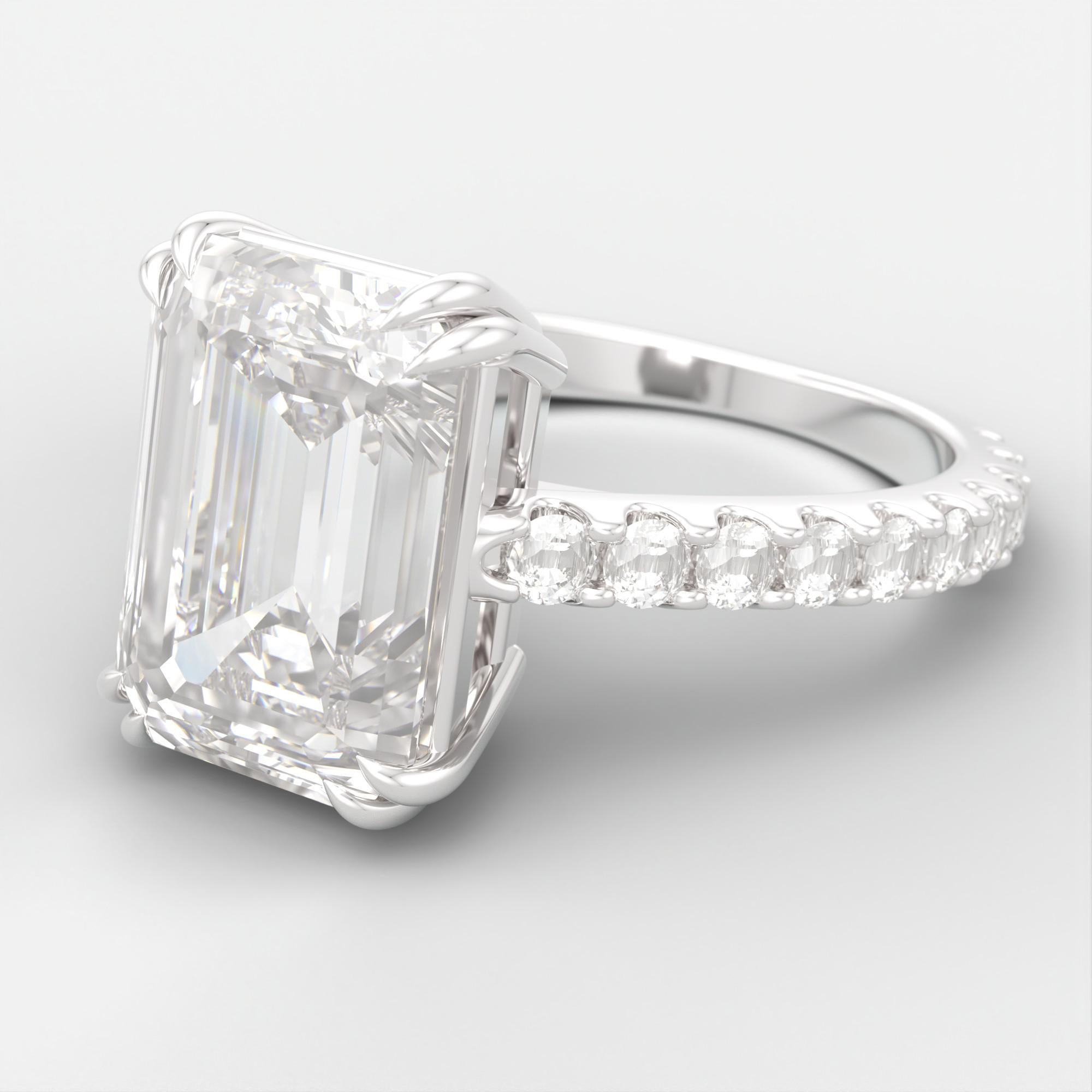 This stunning engagement ring features a magnificent 4.01 carat emerald cut diamond as it's centerpiece, certified by GIA for it's exceptional quality. Set in elegant 18K white gold, the design complements the diamond’s elongated shape with pavé set