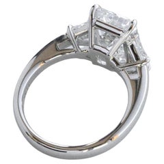 GIA Certified 4.18 Carat Emerald Cut E Color Diamond Three Stone Ring