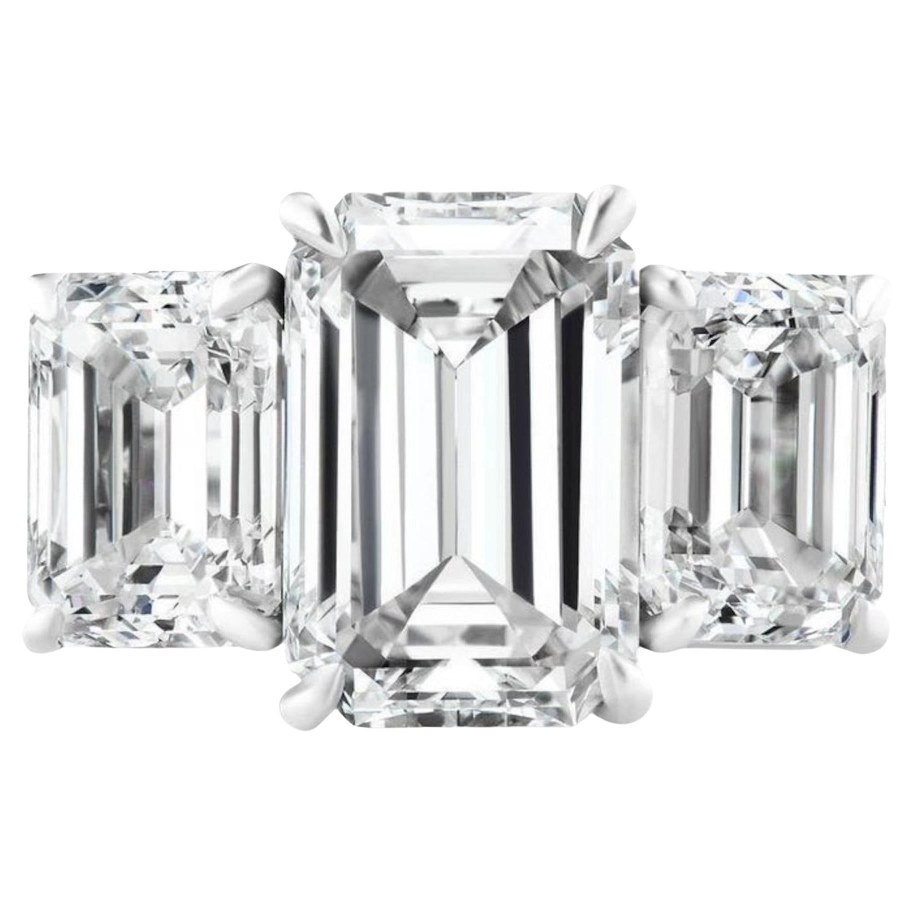 GIA Certified 4.18 Carat Emerald Cut E Color Diamond Three Stone Ring