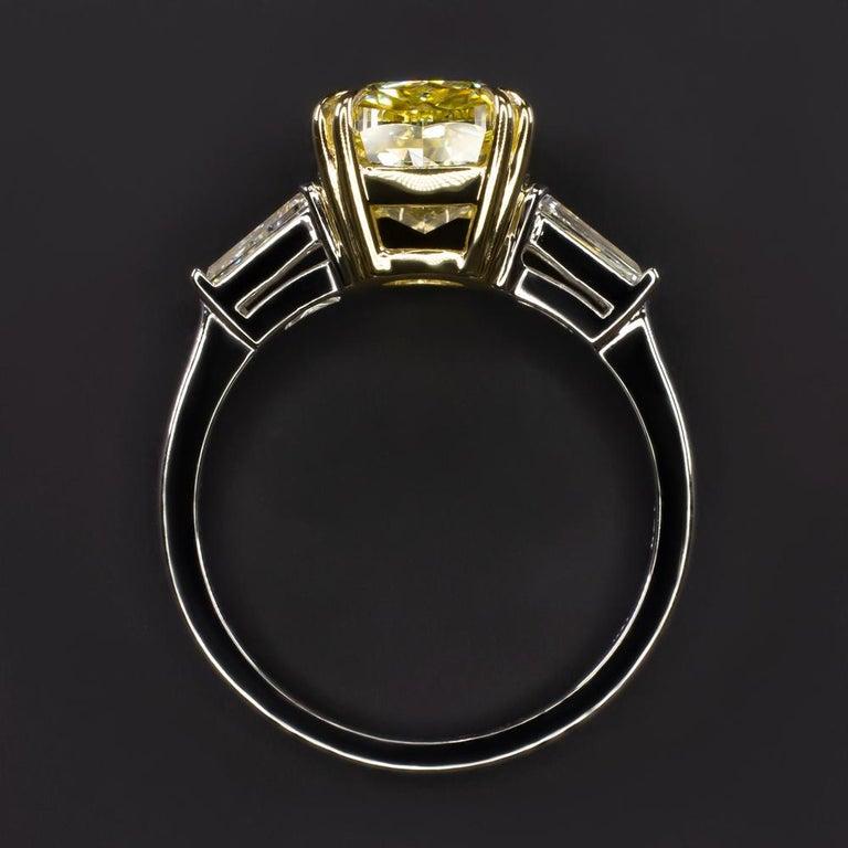 Modern GIA Certified 4 Carat Fancy Intense Yellow Cushion Diamond Platinum Ring