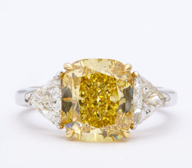 GIA Certified 4 Carat Fancy Intense Yellow Diamond Ring For Sale at