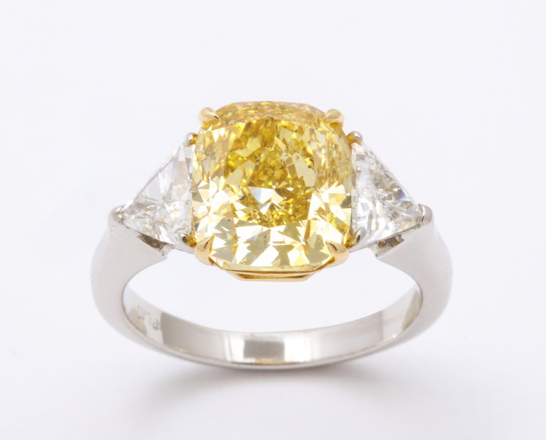 GIA Certified 4 Carat Fancy Intense Yellow Diamond Ring For Sale at