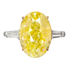 GIA Certified 4 Carat Fancy Intense Yellow Oval Diamond Ring in Platinum