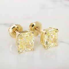 GIA Certified 4 Carat Fancy Yellow Cushion Diamond 18k Yellow Gold Studs