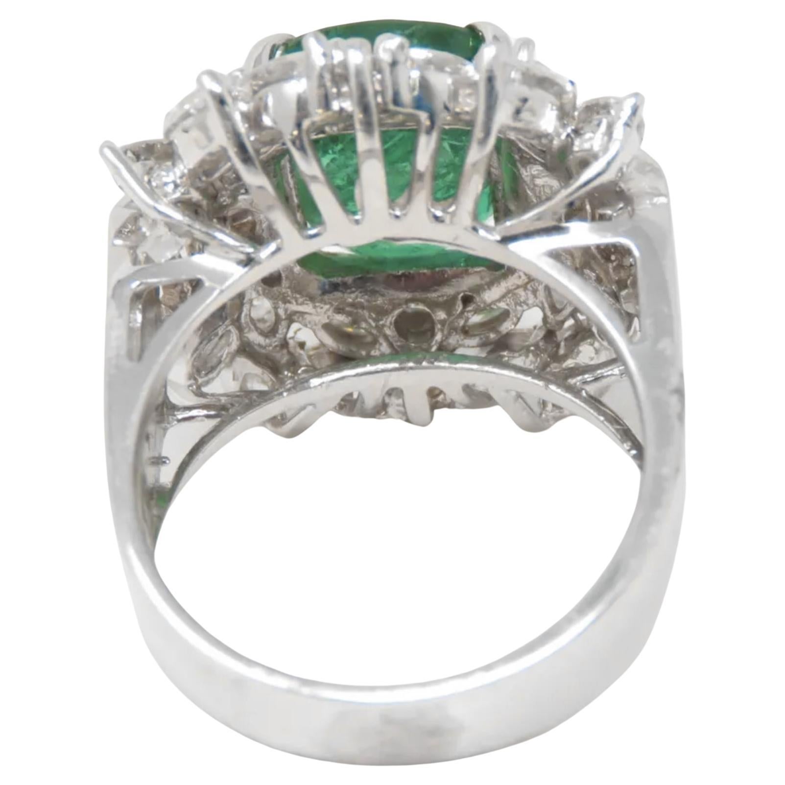 Stunning 4ct Diamond and Natural Emerald Ring

This exceptional ring features a total of 4 carats of diamonds, predominantly in the G-H color and VS clarity range, perfectly complementing the centerpiece—a GIA-certified natural emerald. The emerald
