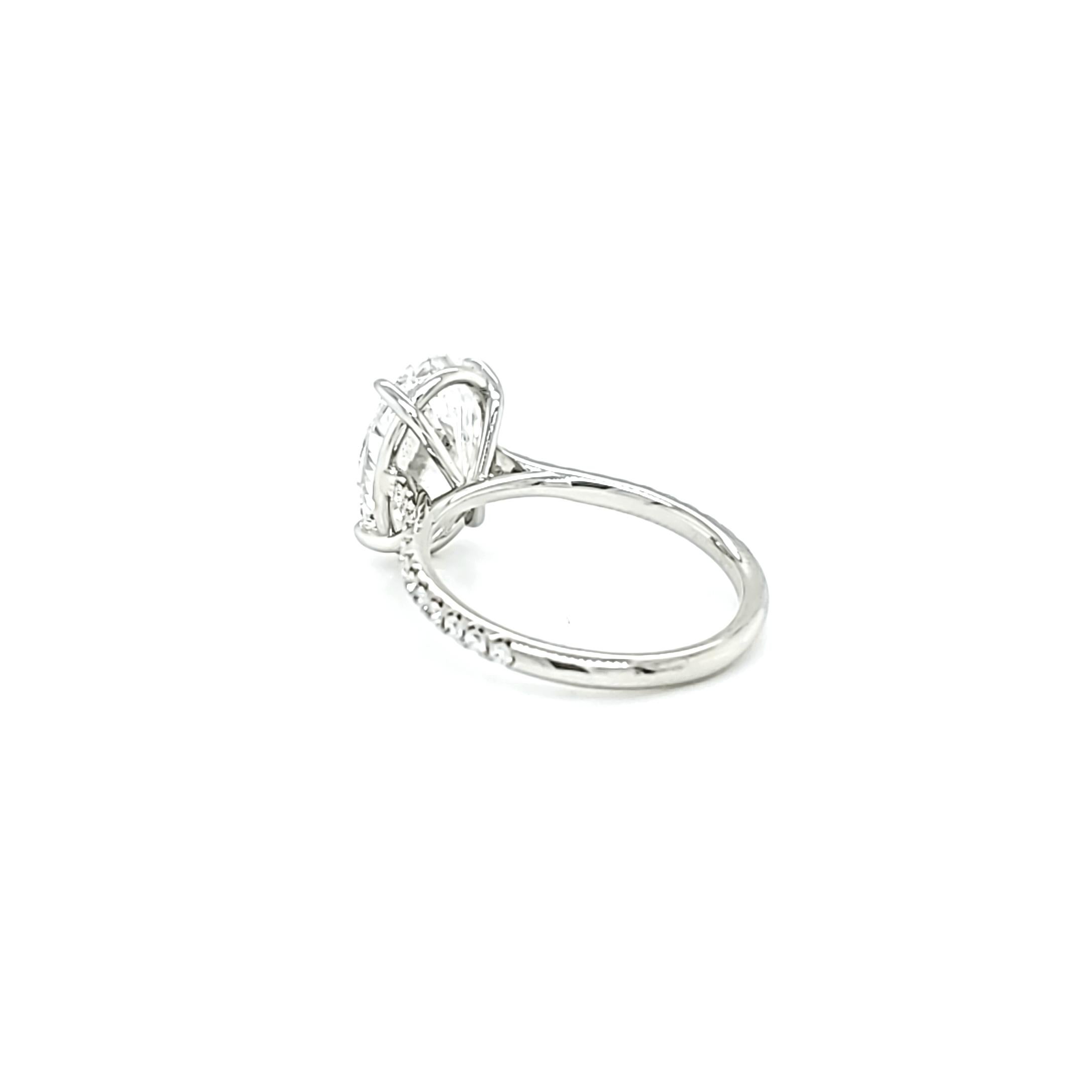 GIA Certified 4 Carat Oval Cut Diamond Ring 1