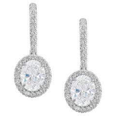 GIA Certified 4 Carat Pear Cut Diamond Dangle Earrings E/F Color
