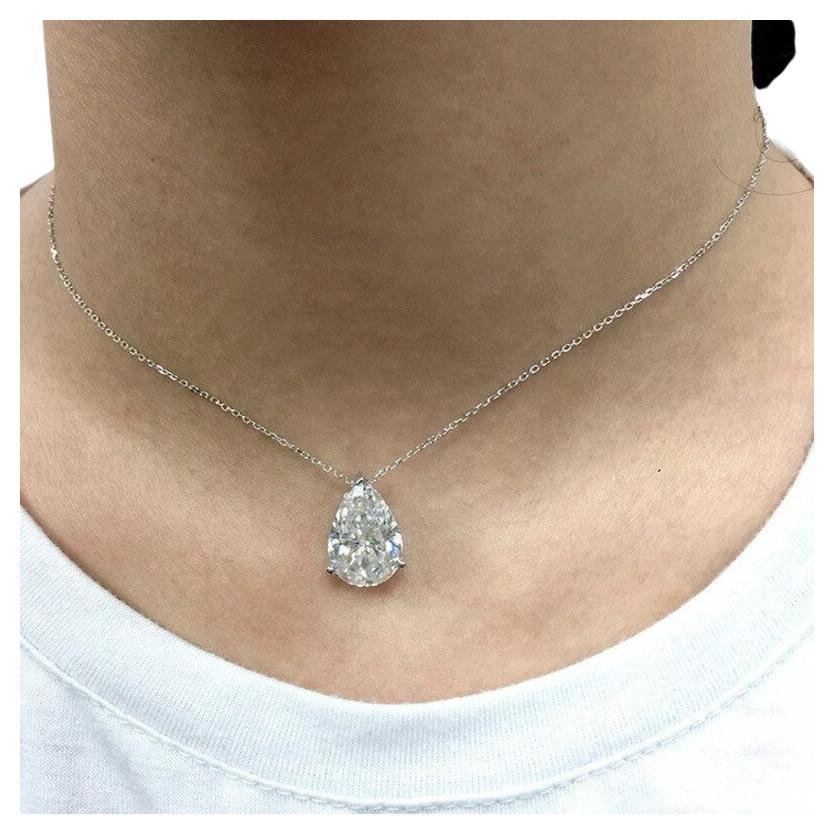 An exquisite 4 carat pear shape diamond pendant platinum necklace 
with:
VS1 Clarity
F: Color
Polish: Excelent
Symmetry: Very Good
Fluorescence: None

