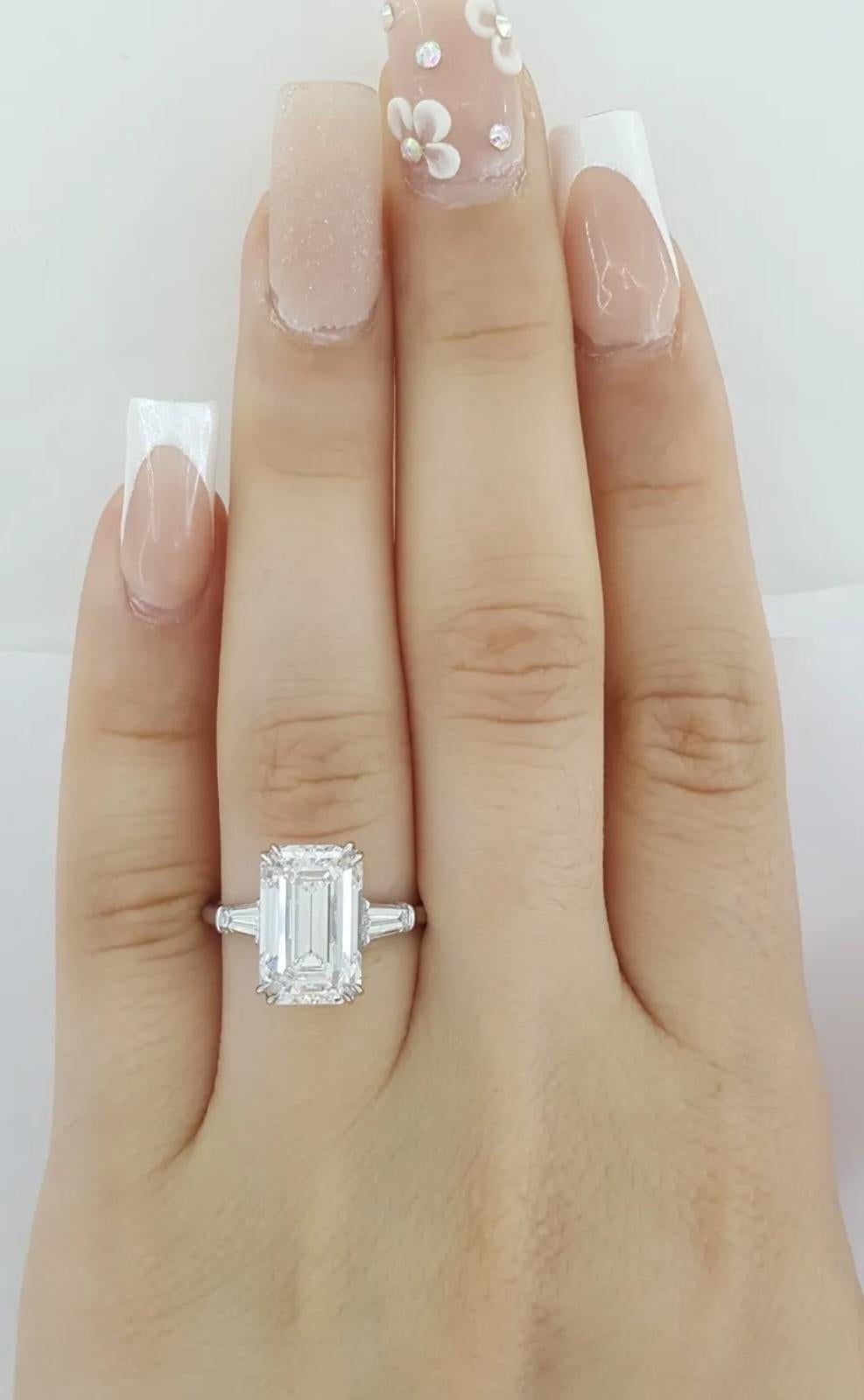Women's or Men's GIA Certified 4 Carat Premium Lenght Emerald Cut E Color Flawless Clarity Ring For Sale