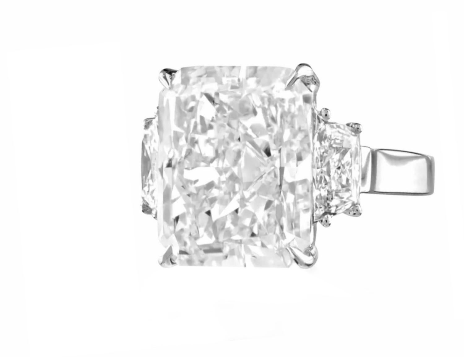 This exceptional platinum ring showcases a GIA-certified 4 carat radiant-cut diamond, graded F color and VS2 clarity, offering outstanding brilliance and a near-flawless appearance. The diamond's excellent polish and symmetry further enhance its
