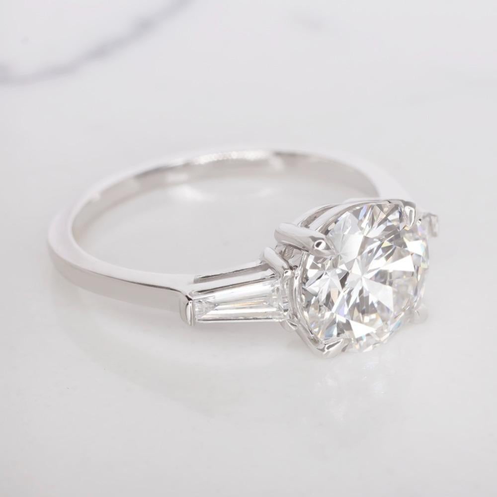 Exquisite 4 carat round brilliant cut diamond is bright white, completely eye clean, and impeccably finished! Cut with absolutely ideal proportions, it displays truly phenomenal sparkle! The diamond is certified by GIA, the world’s premier