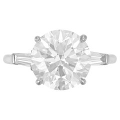 Anillo de diamantes talla redonda color F de 4 quilates con certificado GIA y baguette cónica