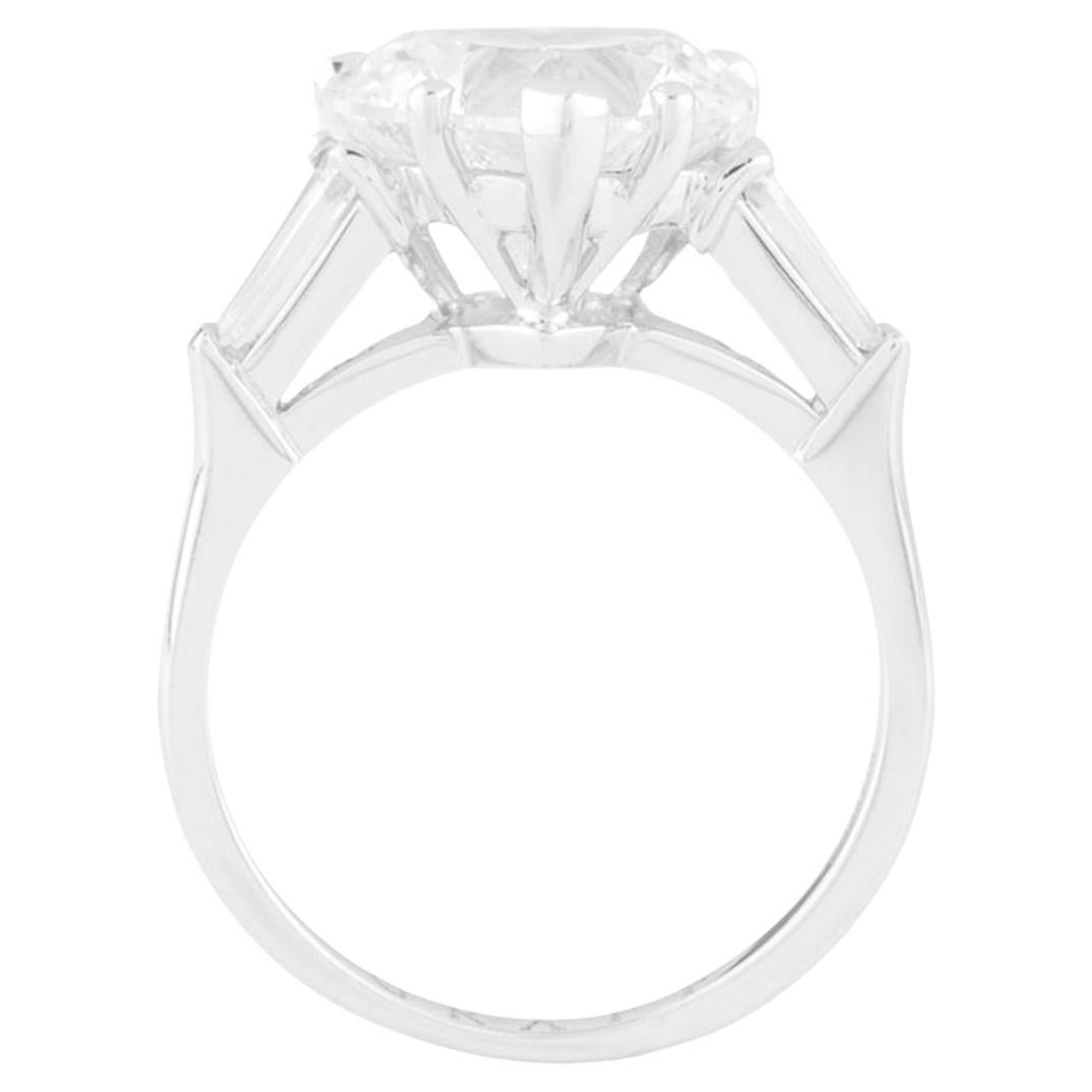 Heart Cut GIA Certified 4 Carat Three-Stone Diamond Engagement Ring in Platinum For Sale