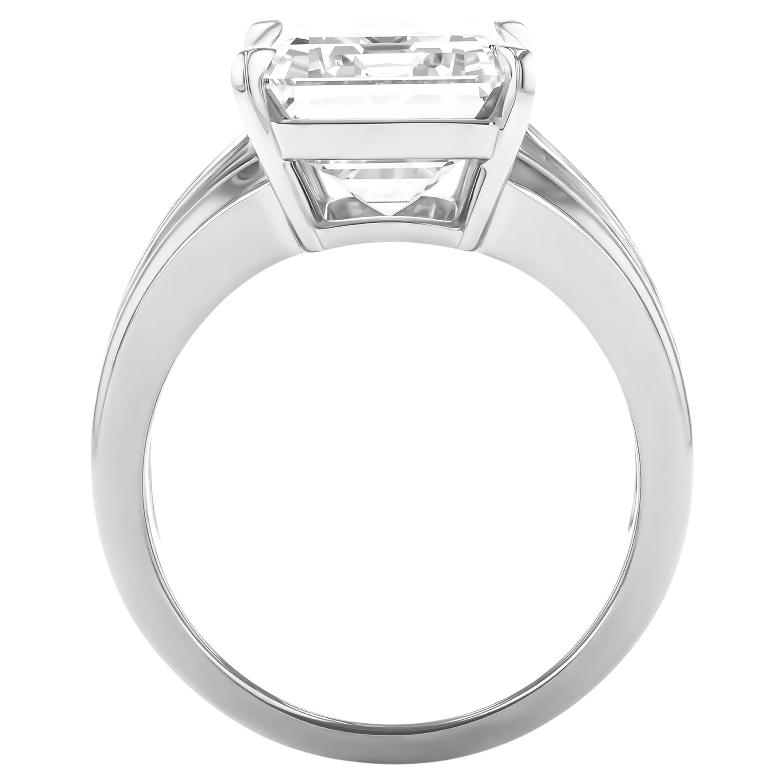 A refined statement of elegance and strength, this exquisite GIA-certified 4.00-carat diamond ring is the epitome of timeless luxury. Expertly crafted in platinum, the center stone is flanked by perfectly matched square emerald-cut side diamonds,