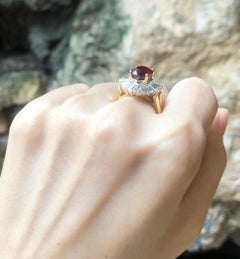GIA Certified 4 Cts Ruby with Diamond Ring Set in 18 Karat Gold Settings