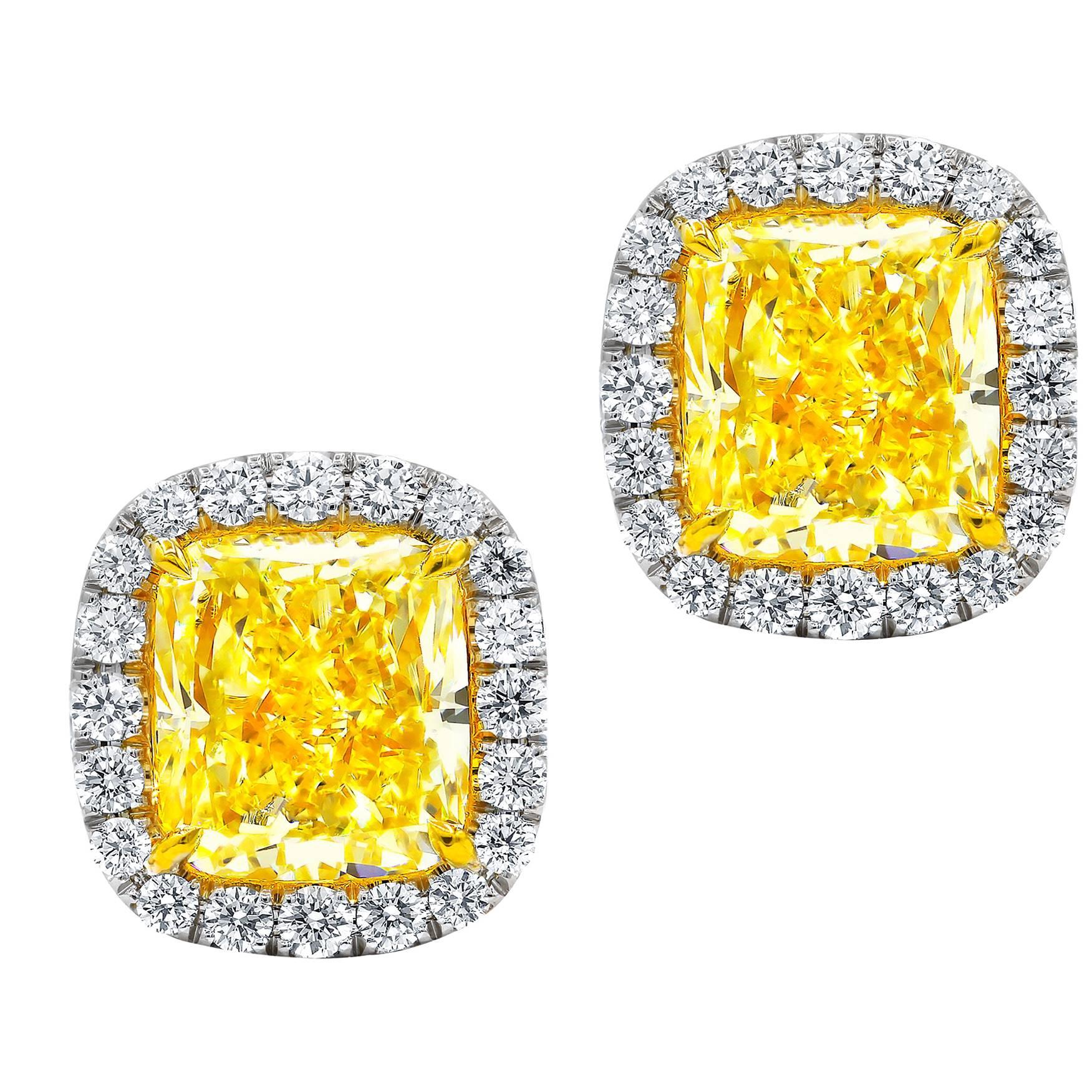 GIA Certified 4.00 Carat Cushion Cut Fancy Yellow Diamond Stud Earrings For Sale